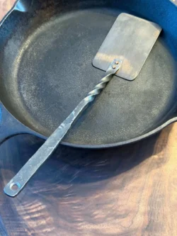 hand forged heirloom carbon steel spatula twist handle copper rivets